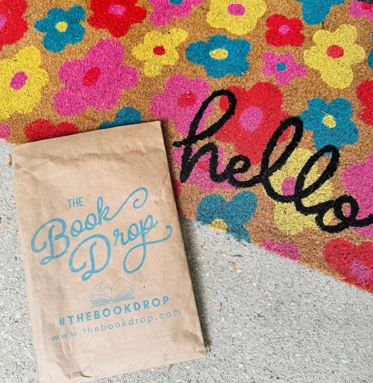 Colorful doormat and The Book Drop package